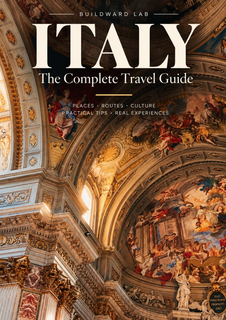 Book cover of Italy: The Complete Travel Guide by Buildward Lab, featuring an ornate Italian Baroque church interior with frescoed ceilings and golden architectural details.